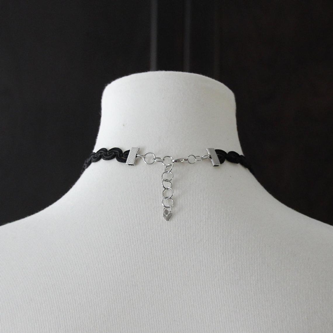 Black Choker. Beautiful black adjustable choker with lobster claw clasp. 13.25 - 15.5 inches long × 7/16 inch wide