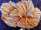 Delicate Quirky Handspun Wool Silk 67 yards Canteloupe and Mauve