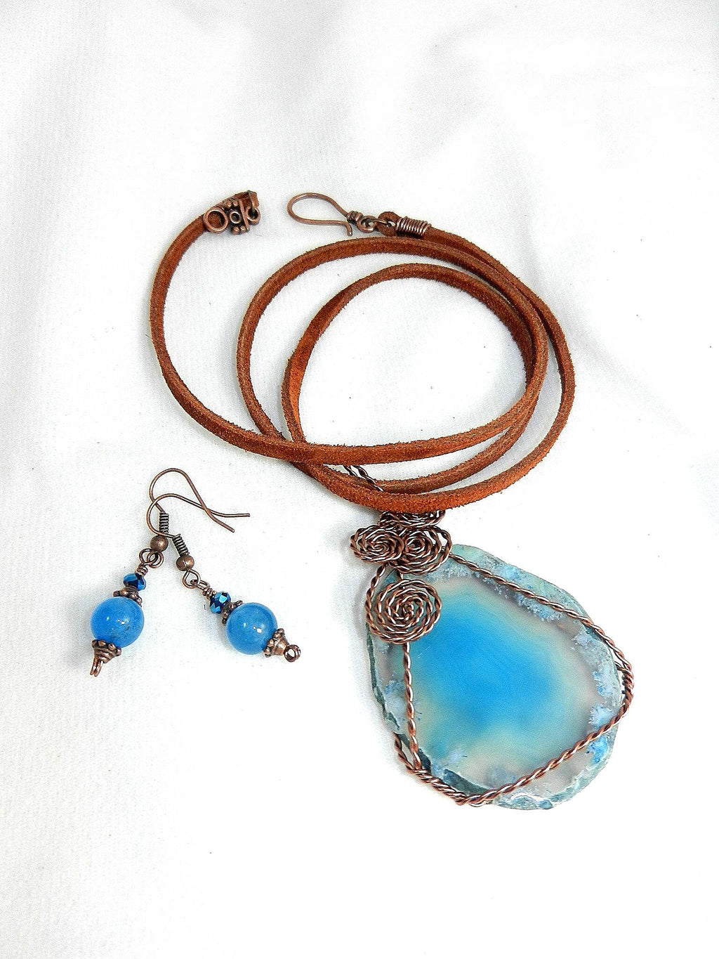 Copper Wire Wrapped Blue Druzy Geode Agate Pendant with Matching Earrings and a Brown Suede Necklace