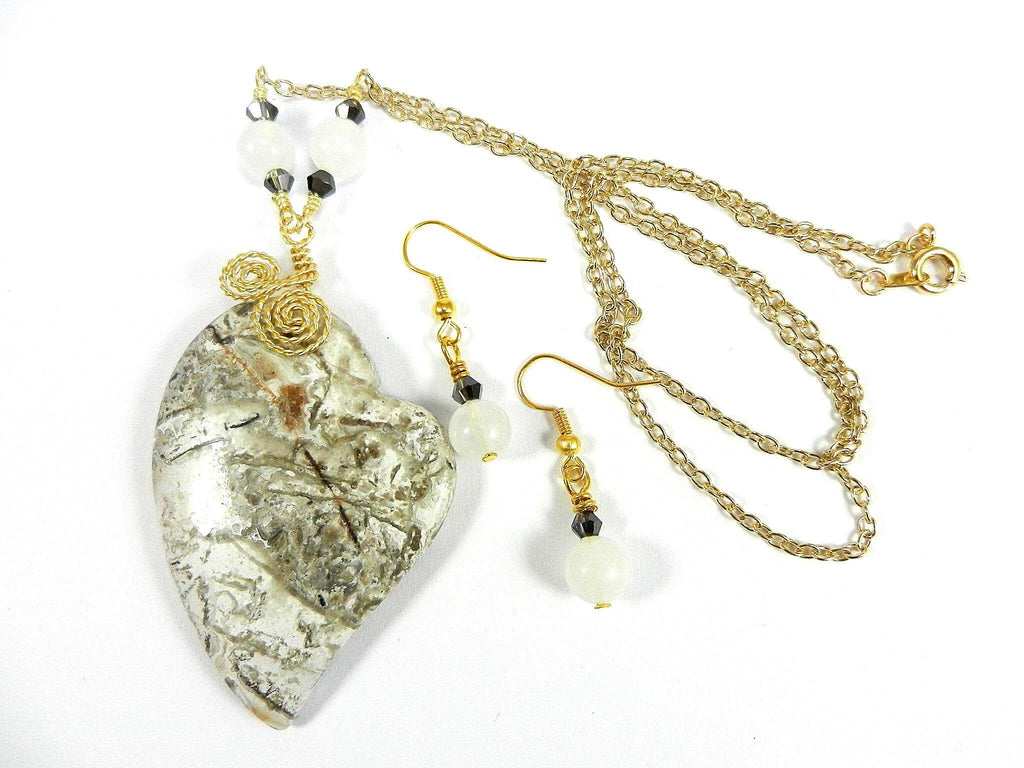 Tree Agate Heart Shaped Gemstone Pendant Gold Wire Wrapped with a White Background and Green and Grey Lines with Matching Earrings