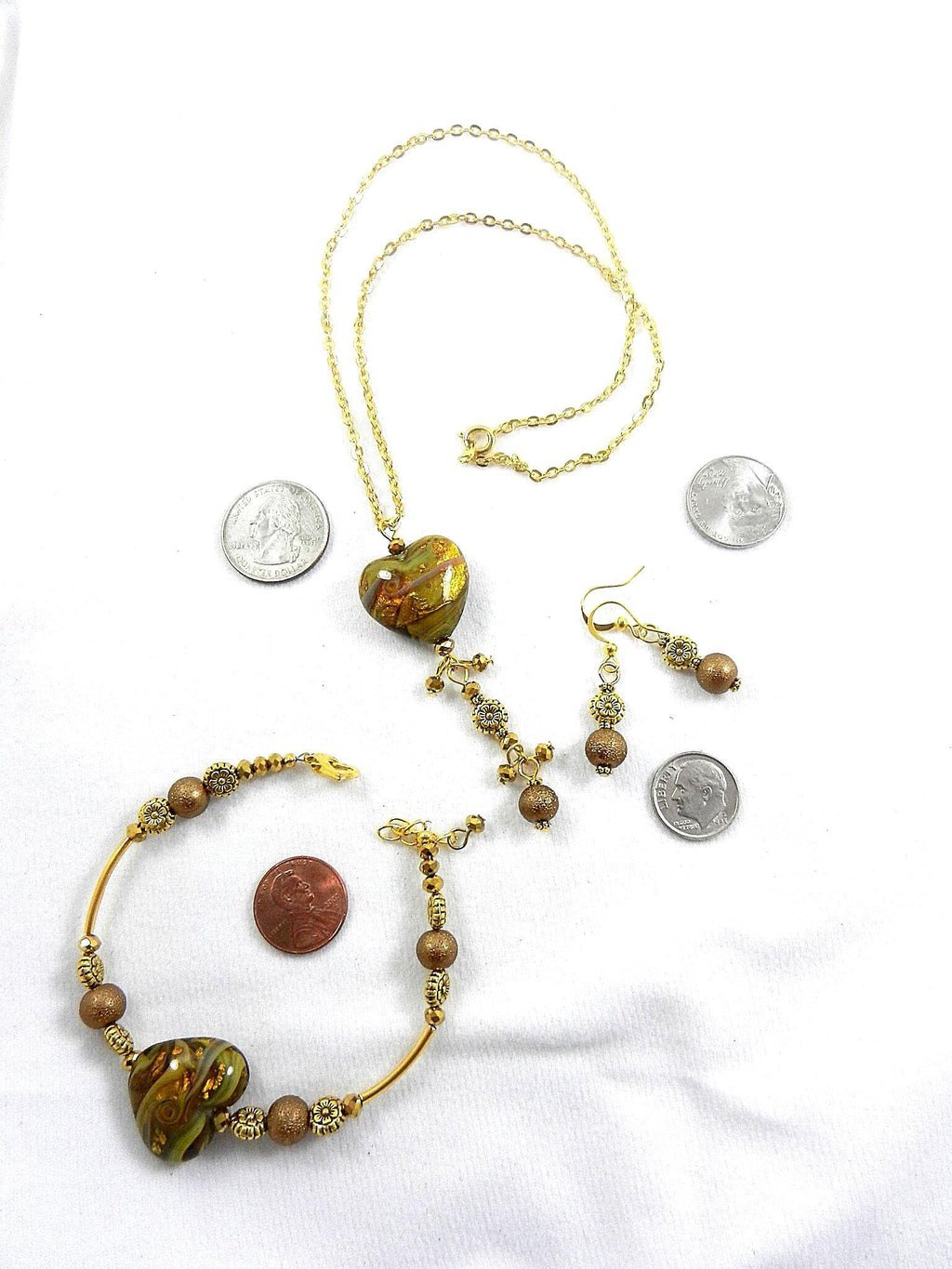 Gold Lamp Work Heart Necklace with a Matching Bracelet and Earrings