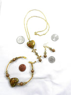 Gold Lamp Work Heart Necklace with a Matching Bracelet and Earrings