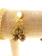 Gold Lamp Work Heart Necklace with a Matching Bracelet and Earrings