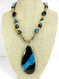 Teardrop Agate Gemstone in Blue and Black on a Gold Bead Necklace with Matching Fire Agate Earrings