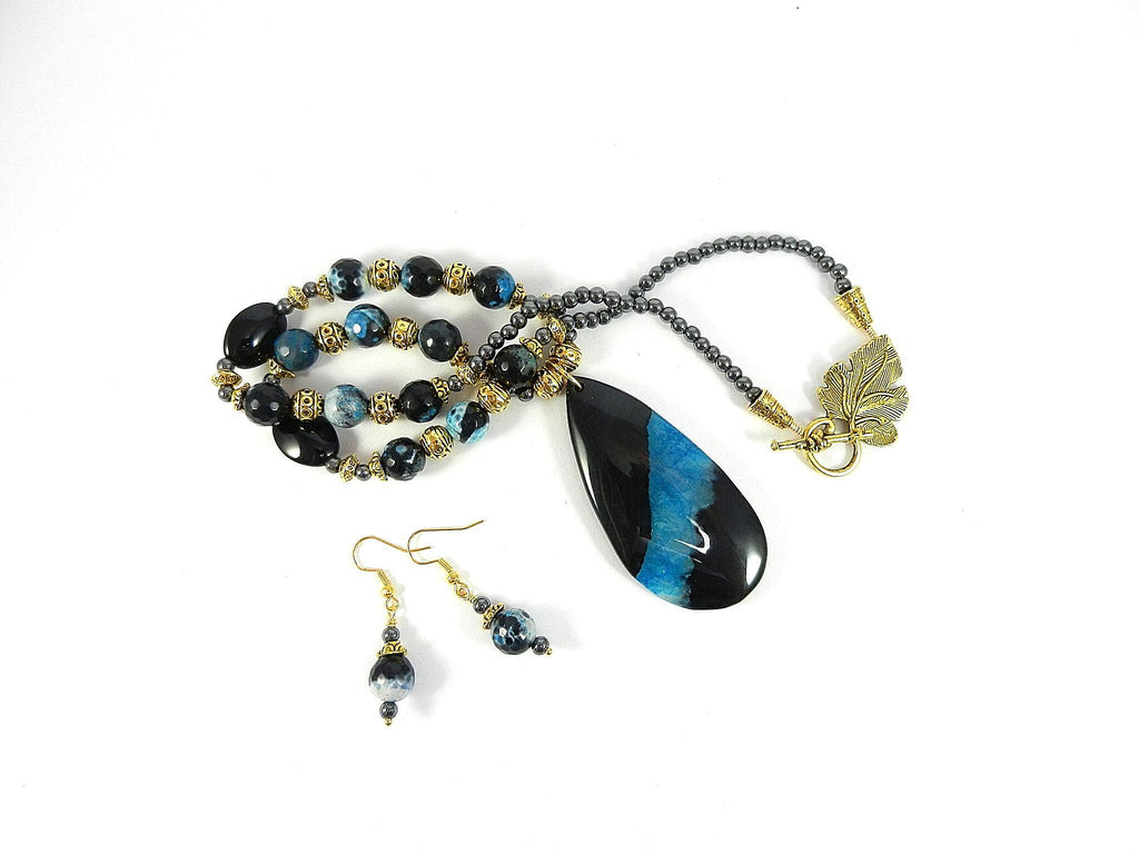 Teardrop Agate Gemstone in Blue and Black on a Gold Bead Necklace with Matching Fire Agate Earrings