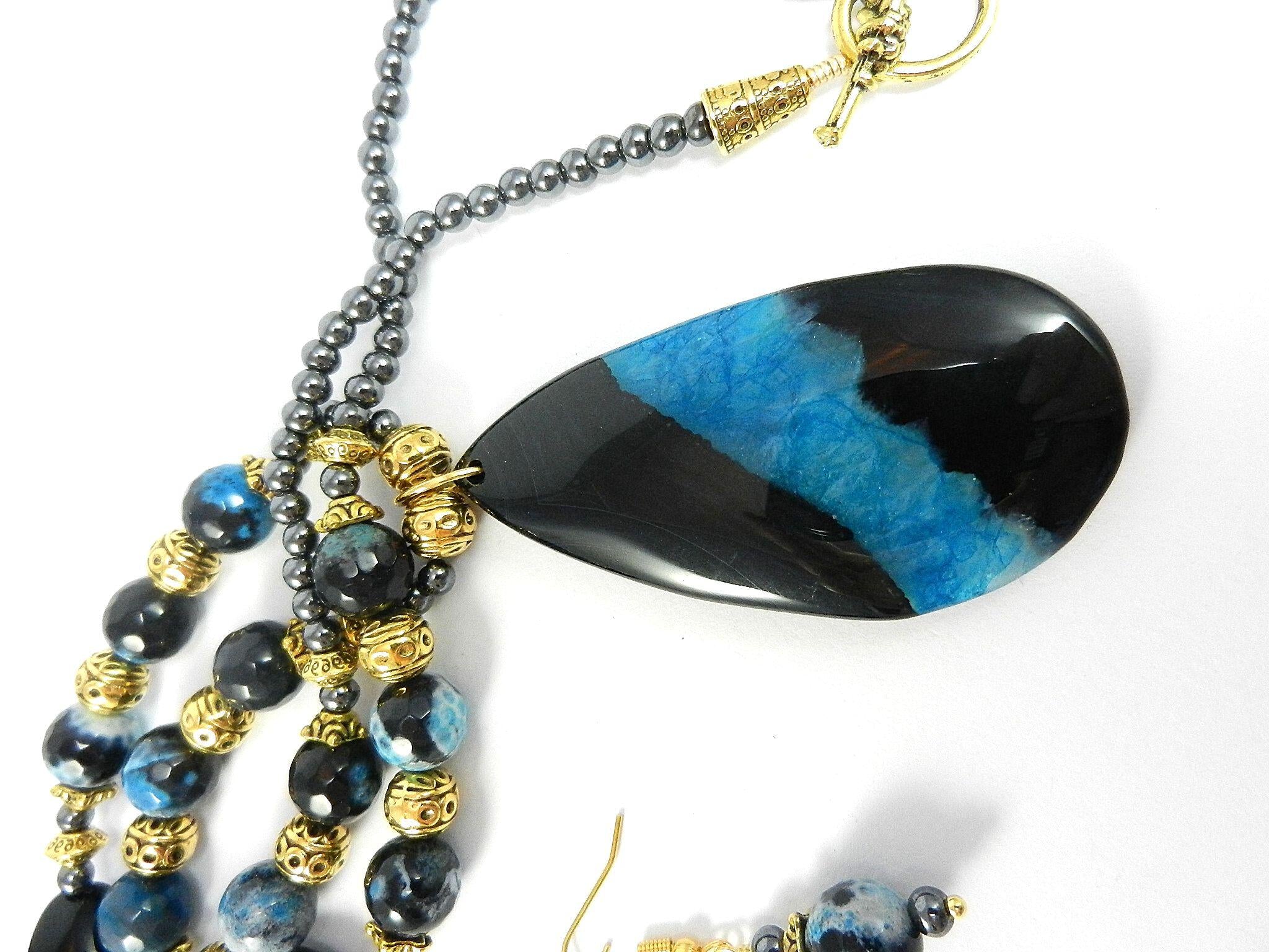 Teardrop Agate Gemstone in Blue and Black on a Gold Bead Necklace with Matching Fire Agate Earrings