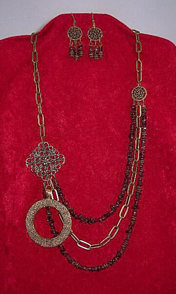 Three Strand Garnet Asymmetrical Necklace and Earrings with a Bronze Pendant