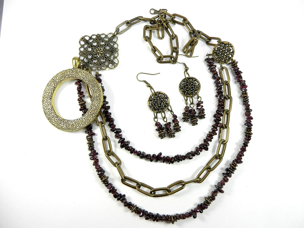Three Strand Garnet Asymmetrical Necklace and Earrings with a Bronze Pendant