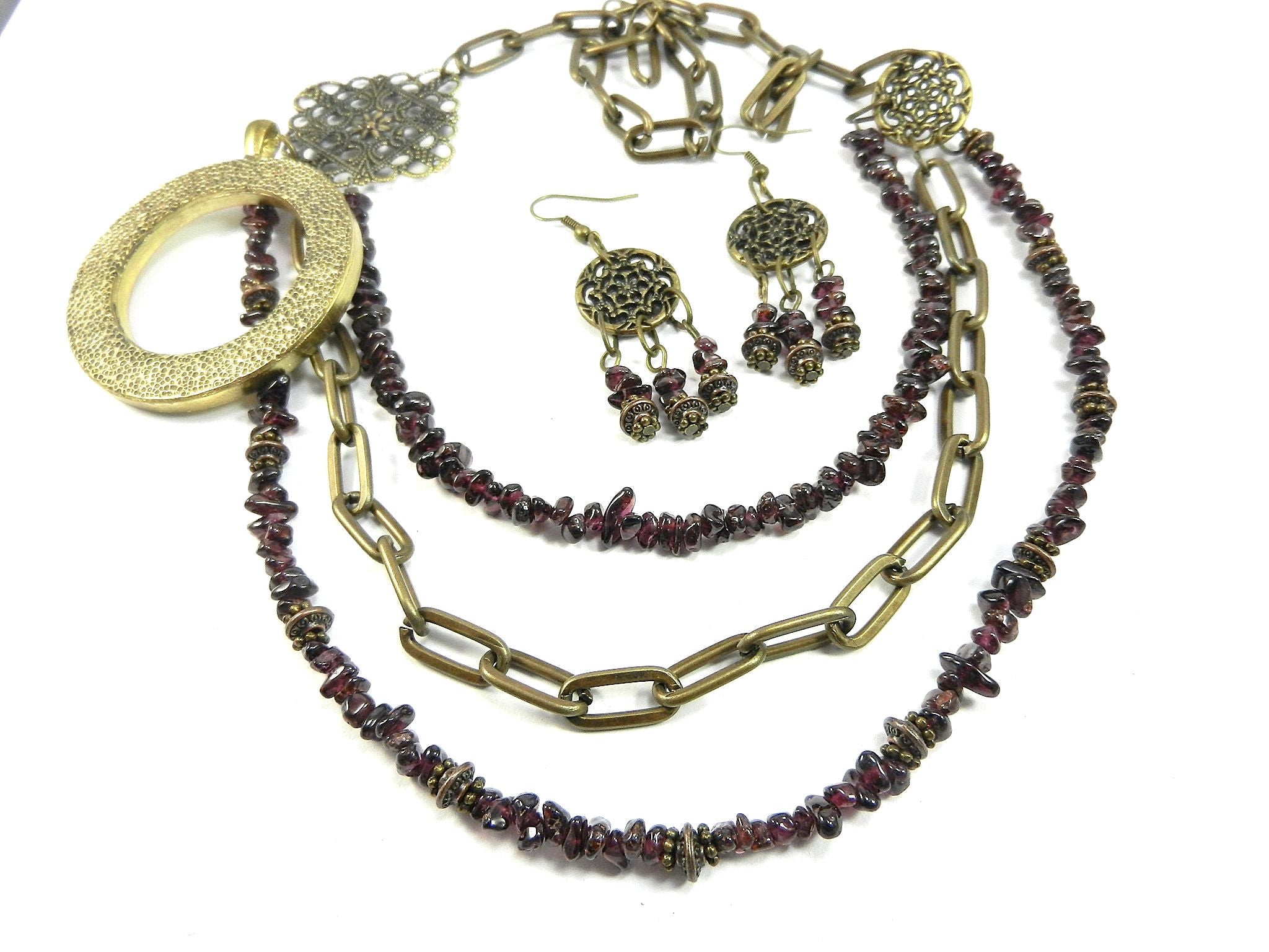 Three Strand Garnet Asymmetrical Necklace and Earrings with a Bronze Pendant