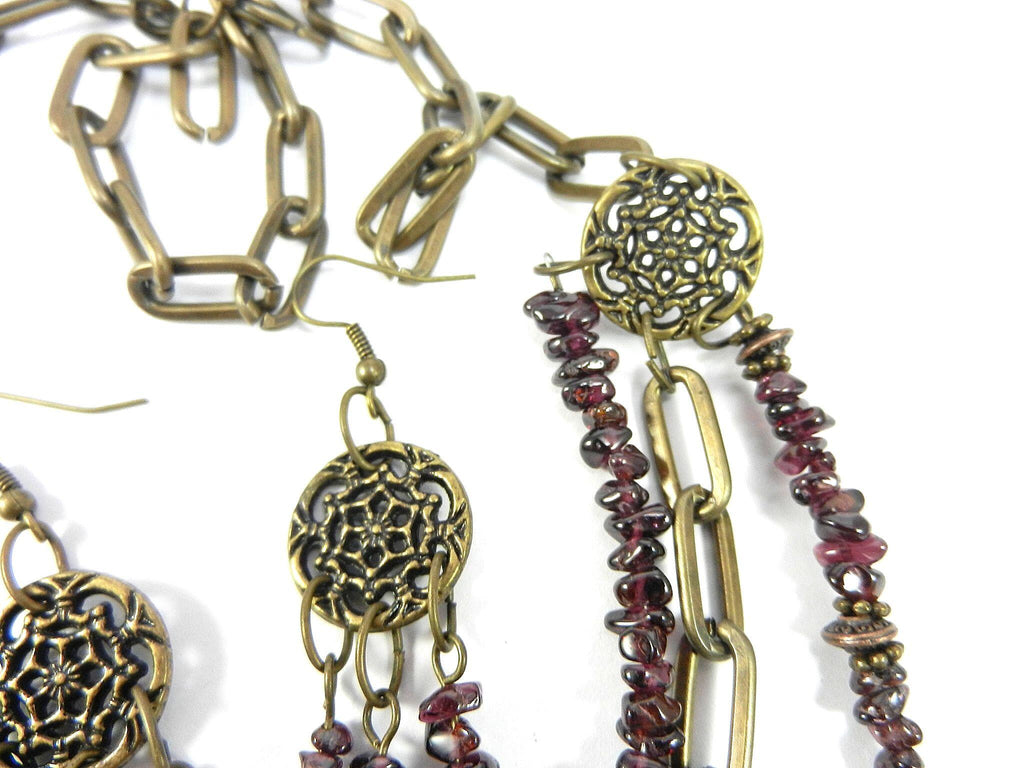 Three Strand Garnet Asymmetrical Necklace and Earrings with a Bronze Pendant