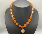 Necklace set | Wire-wrapped agate pendant, 1930s Czech honey amber molded glass rounds, vintage clear amber-reigned rounds, Czech nesting folded disks