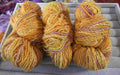 Handspun dk weight wool light gold mix