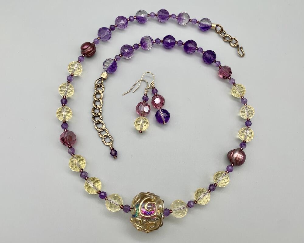 Necklace set | Artisan lampwork rainbow center focal bead, faceted ametrine rounds, amethyst, pearls, crystals