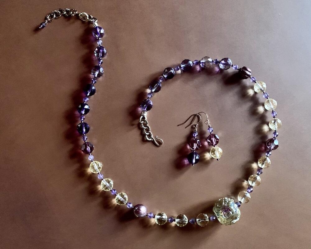 Necklace set | Artisan lampwork rainbow center focal bead, faceted ametrine rounds, amethyst, pearls, crystals