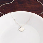 Hammered sterling silver diamond necklace