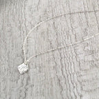 Hammered sterling silver diamond necklace